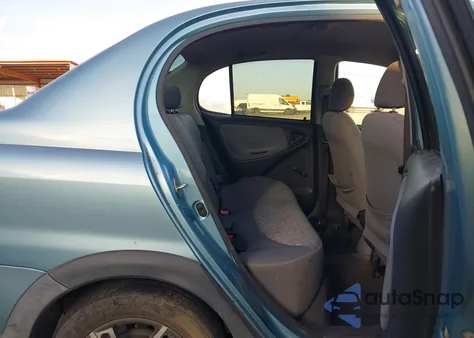 2001 Toyota Echo из США, поврежденный, VIN JTDBT123710177921